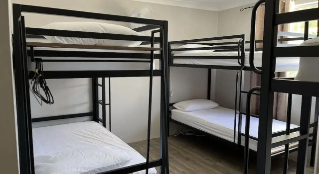 Кровать в общем номере Homely Inn Hostel