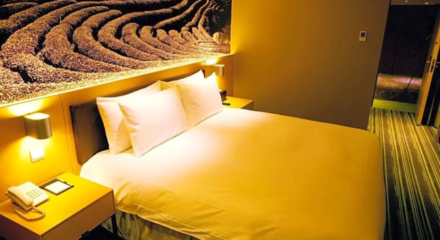 Номер Comfort Tao Garden Hotel