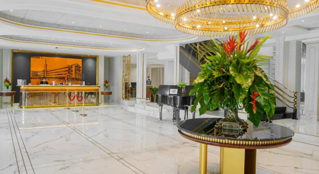 Кровать в общем номере Hotel Savoy Homann