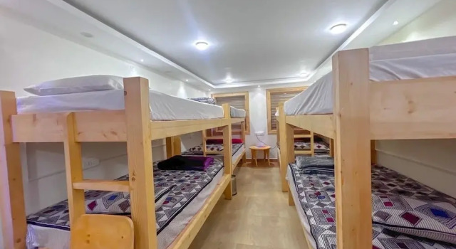 Кровать в общем номере Rozana Retreats Ooty