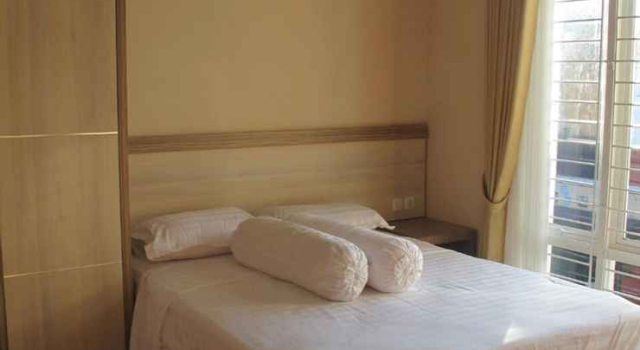 Modern Chic Room at Gendis Homestay, Book Hotel Sleman Yogyakarta Province