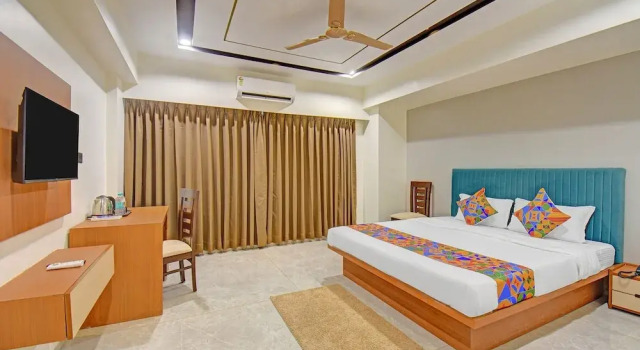 Номер Deluxe FabHotel New Moshi Grrand