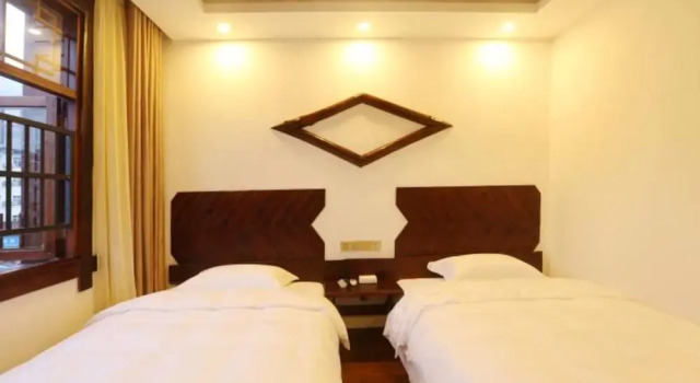 Hong Jin Inn, Забронировать Отель Чжанцзяцзе Хунань