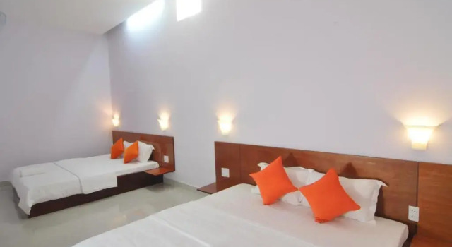Четырёхместный номер Standard Chau Tran Hotel.