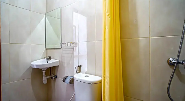 Номер Deluxe Kadek Bagus Guesthouse Denpasar Mitra RedDoorz