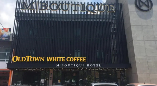 Łóżko w pokoju wieloosobowym M Boutique Kampar
