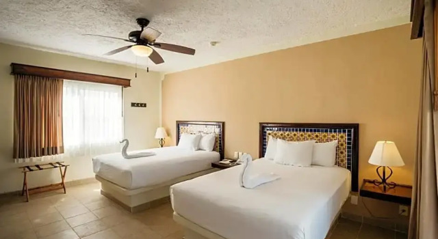 Четырёхместный номер Standard с видом на сад Petit Lafitte Beach Front Hotel & Bungalows