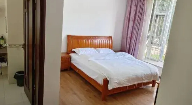 Кровать в общем номере Jinyu Homestay (Lijiang Old Town Branch)