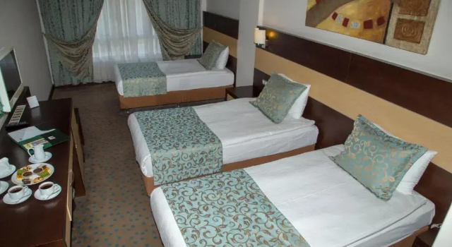 Трёхместный номер Standard Mom Hotel