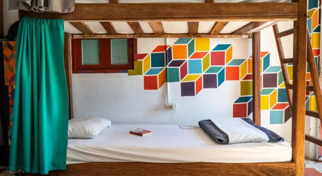 Кровать в общем номере Casa Kayam Hostal y Residencia Artistica