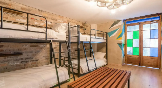 Кровать в общем номере Delgadillo Boutique Hotel by Socialtel