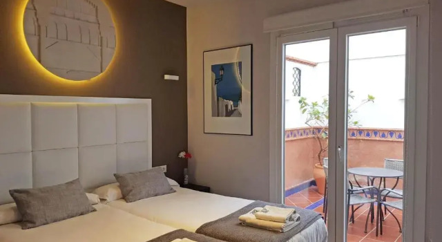Апартаменты Apartamentos Caballerizas 6