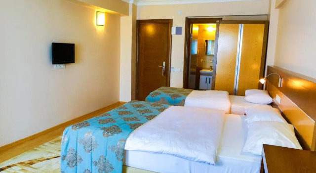 Standardowy trzyosobowy pokój Perla Otel