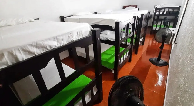Кровать в общем номере Hotel Sol del Desierto