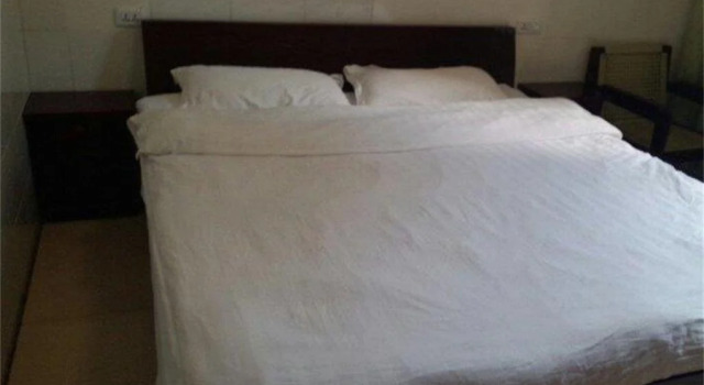 Xinwen Xingsheng Business Hotel, Book Hotel Hoteller i Sichuan med parkering, Parkering