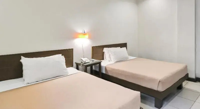 Четырёхместный номер Deluxe Governor Forbes Inn - Manila City Center