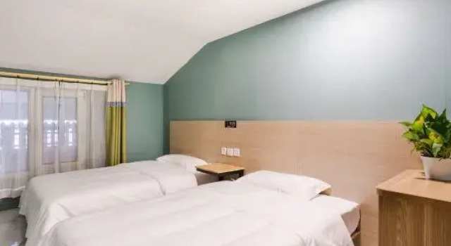 Номер Economy Mijia Youth Hotel
