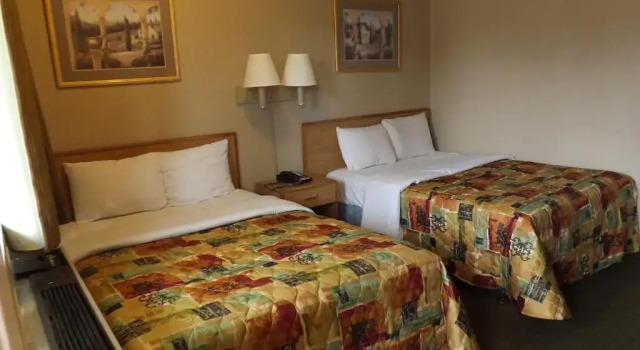 Четырёхместный номер Standard Executive Inn