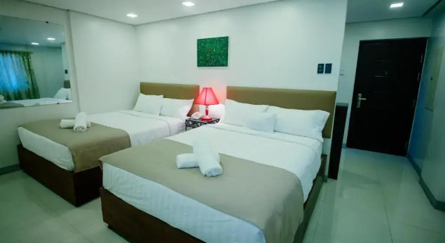 Четырёхместный номер Deluxe Belltower CSheLi Suites Bantay - Vigan