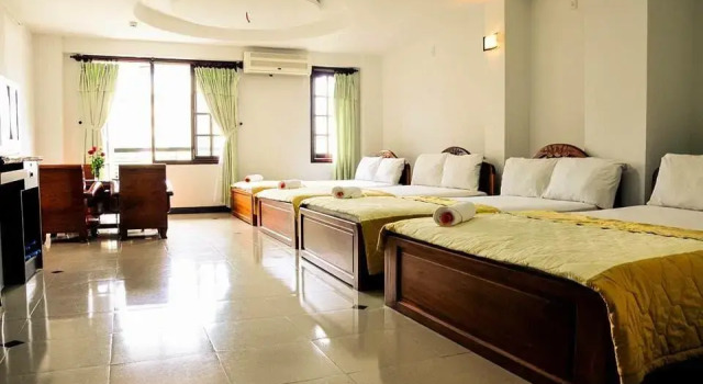 Кровать в общем номере Minh Cat Hotel