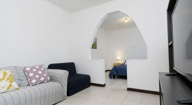 Кровать в общем номере Casa Bogotana