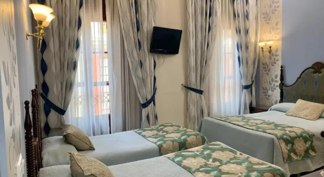 Четырёхместный номер Hotel Europa Boutique Sevilla