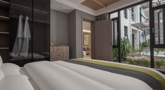 Семейный люкс c 1 комнатой с видом на сад Minyue Xiaozhu Designer Garden B&B (Gongchen Tower Branch) in Weishan Ancient City