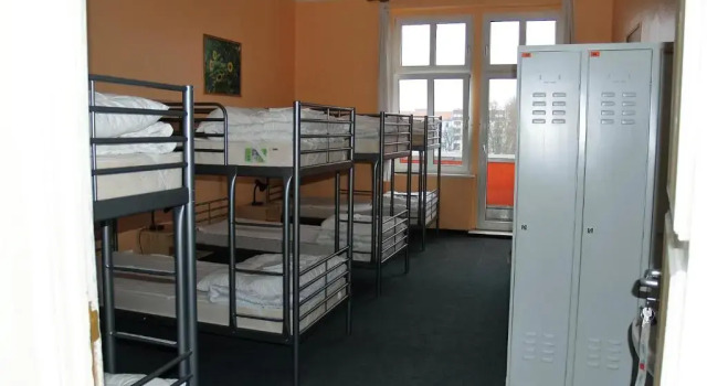 Кровать в общем номере Happy Go Lucky Hotel + Hostel
