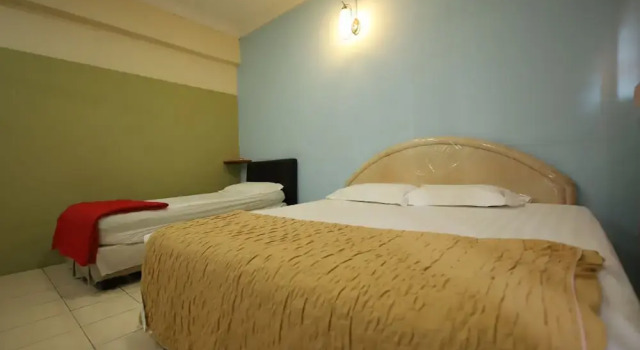 Трёхместный номер Standard OYO Homes 90575 C.k Bahau Homestay