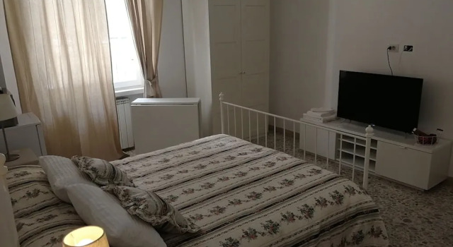 Triple Room With Private Bath 10 Min From Tiburtina Station, Rezervovat Apartmán Hotely v Lazio s parkováním, Parkování