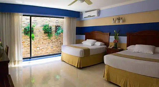 Junior suite quadrupla Hotel Plaza Colonial
