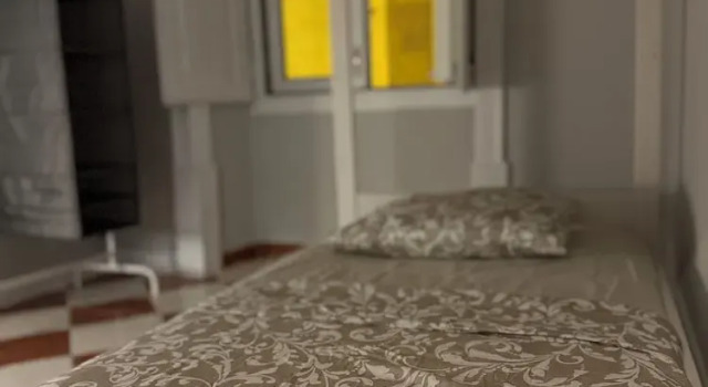 Кровать в общем номере Faro Coast Guest House