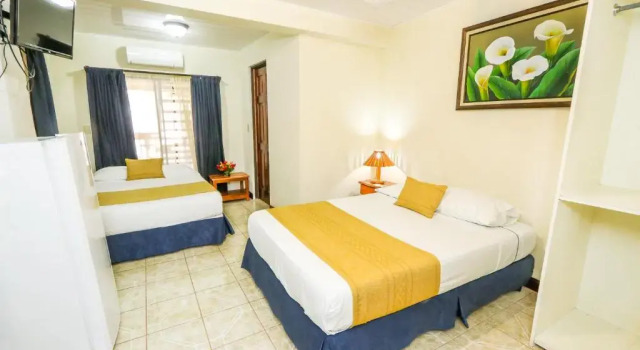 Четырёхместный номер Standard Hotel Flor Blanca