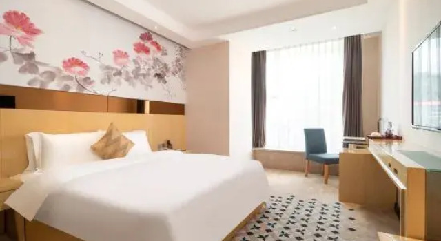Номер Superior с красивым видом из окна Paco Business Hotel Luo Gang Wan Da Branch