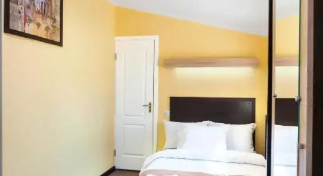 Camera Economy Orange Hotel