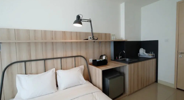 Classic Studio Tree Park Apartment near ICE BSD By Travelio