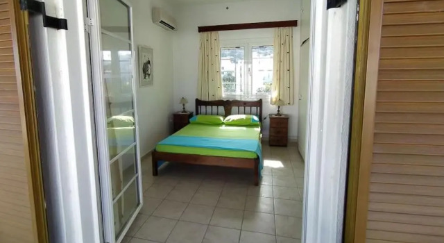 ALEXANDRA, 1 min walk to Magazia beach, Reservar Apartamento Molos Grécia