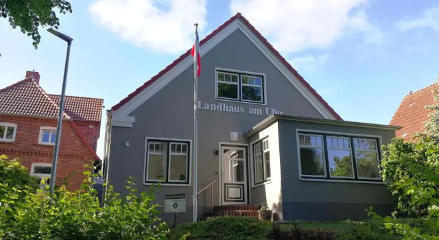 Landhaus Am Ufer - Wohnung 4, Забронировать Дом для отпуска Коттеджи Хайлигенхафен, Коттедж