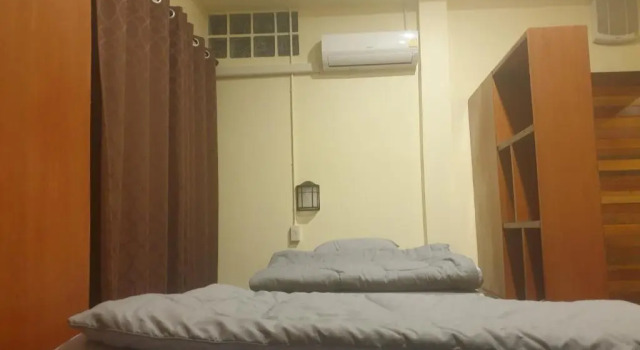 Кровать в общем номере Titans House Chiang Dao