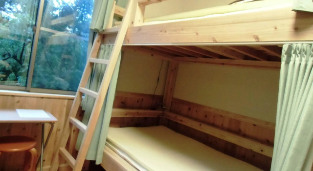 Кровать в общем номере (мужской номер) Guest House Yakushima