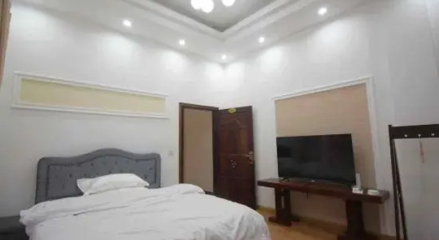 Люкс Dongxing Guomen e Homestay