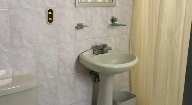 Кровать в общем номере Casa Ezpania