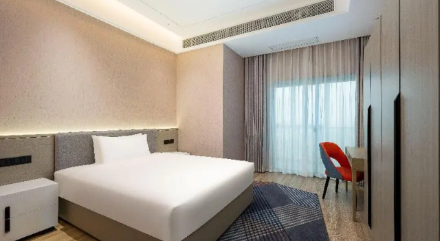 Двухместный люкс с 2 комнатами Holiday Inn Express Qidong Economic Zone by IHG