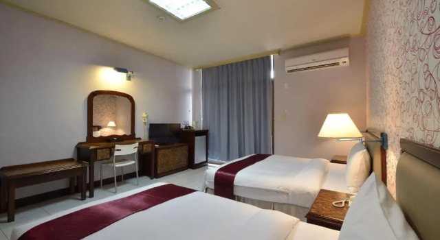 Четырёхместный номер Standard Jiuning Business Hotel