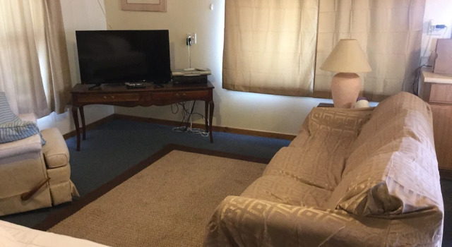 Коттедж c 1 комнатой Waters Edge Motel