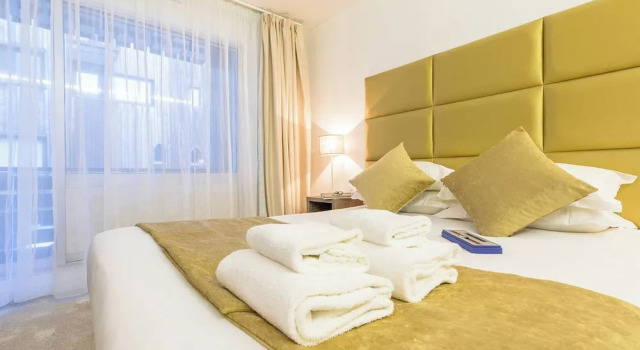 Четырёхместный номер Superior с балконом Madame Vacances - Hôtel Courchevel Olympic