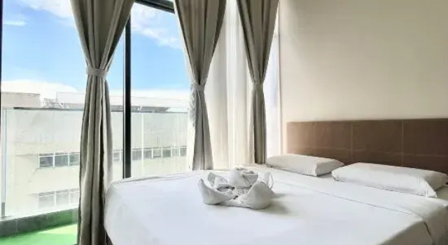 Семейный люкс с балконом The Shore Kota Kinabalu