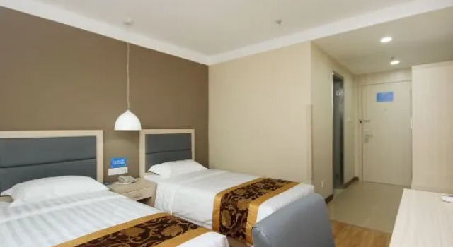 Кровать в общем номере Shenyang Fuqiang Kangle Express Hotel