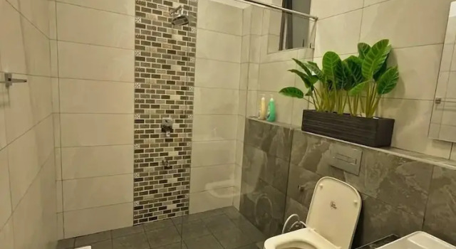 Апартаменты Nyali Beachfront Apartments Baobab waves