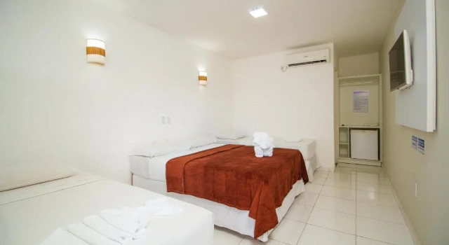 Четырёхместный номер Standard Na Praia Hotel